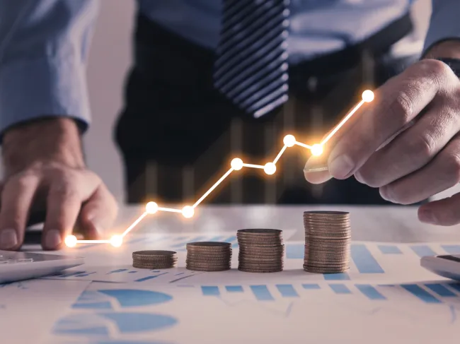 graph trending up with coins